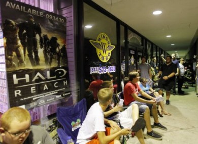 Many video gamers queued up overnight to buy Halo: Reach when it was released on Tuesday morning.