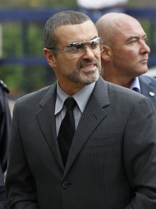 George Michael arrives at Highbury Magistrates Court this afternoon to attend his sentencing hearing.