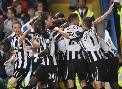 Newcastle United's players celebrates their fourth goal against Chelsea