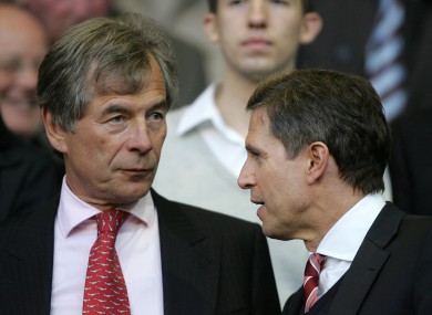 Liverpool chairman Martin Broughton (left) is seeking to stop co-owner Tom Hicks from replacing CEO Christian Purslow (right) on the Board of Directors, and force through the sale of the club.