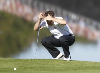 Europe's Lee Westwood lines up a shot on the 12th hole on the final day of the Ryder Cup