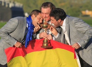 Sergio Garcia, left, Miguel Angel Jimenez, center, and Jose Maria Olazabal celebrate with the trophy
