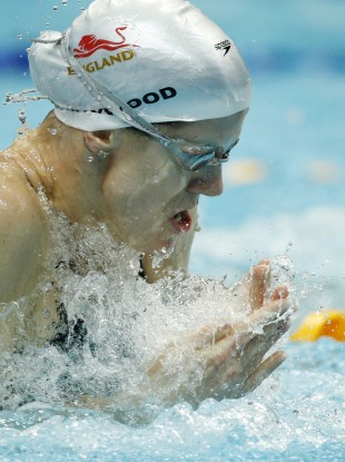 England's Kate Haywood competes in the Women's 50m Breaststroke final. 20% of her teammates have been affected by stomach bugs blamed on the quality of water in the S.P. Mukherjee Aquatics Centre.