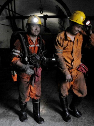 Rescuers prepare to go underground after the explosion at the state-run mine in central China.