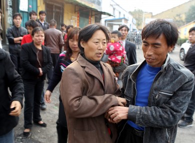 Relatives of the trapped miners await news on the fates of their loved ones.