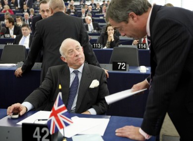 Godfrey Bloom (left) speaks with his UKIP party leader, Nigel Farage, yesterday in the European Parliament before shouting Nazi slogans at a German MEP.