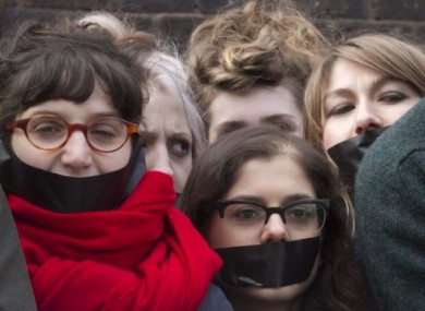 Students protest in London yesterday ahead of today's vote on tuition fees.