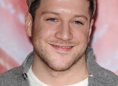 Of course Matt Cardle's all smiles - he's almost certain to win this year's X Factor.