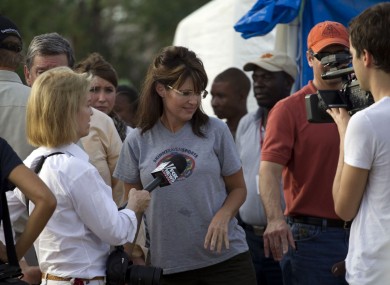 Sarah Palin is interviewed by Fox News's Greta van Susteren during her visit to a cholera treatment centre run by Samaritan's Purse in Cabaret, Haiti.