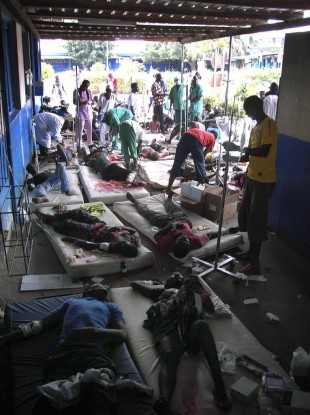 Patients being treated at a hospital in the Ivory Coast, where only one hospital remains open and medical supplies are of extremely short supply.
