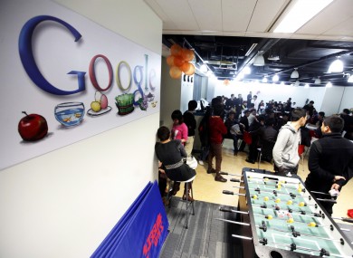 Advertising staff hold a protest at Google's Shanghai offices. Google has accused the Chinese government of being behind problems with the Gmail accounts of Chinese users.