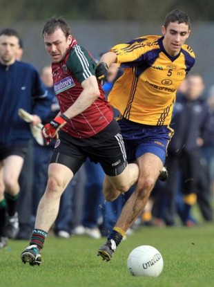 James McCarthy of DCU battles with Ryan Boyle of St Mary's in the Sigerson Cup