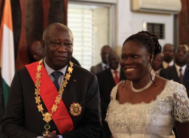 Laurent Gbagbo stands with his wife Simone during his swearing-in ceremony at the Presidential Palace in Abidjan in December. Both he and Alassane Ouattara, considered the winner of the election, took oaths of office as Gbagbo refused to cede power.