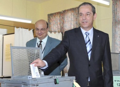 File photo of Malta's Prime Minister Lawrence Gonzi casting a vote in the 2009 European elections.