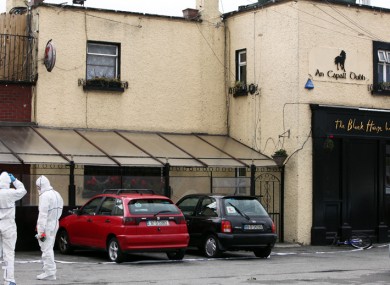 Members of the Garda technical bureau at the Black Horse Inn in Inchicore in Dublin this morning.