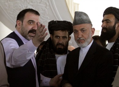 Ahmed Wali Karzai with his brother Hamid Karzai in Kandahar province in October last year.