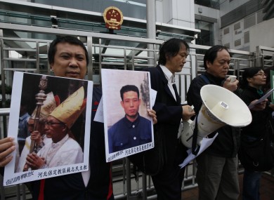 Catholics from Hong Kong protest against China's plans to appoint a bishop without Vatican approval in December. Yesterday's excommunication is the third in eight months.