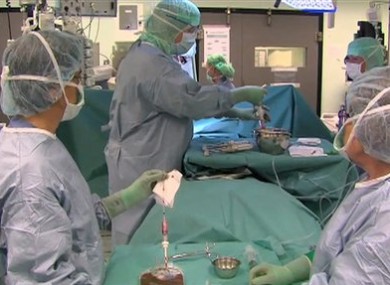 9 June 2011: Prof Paulo Macchiarini, centre, and colleagues perform the artificial windpipe transplant in Sweden.