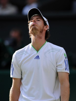 Andy Murray appears dejected in his match against Spain's Rafael Nadal during day eleven of the 2011 Wimbledon Championships