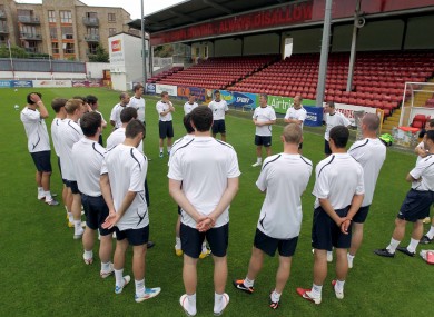Damien Richardson addresses his players during training on Tuesday.