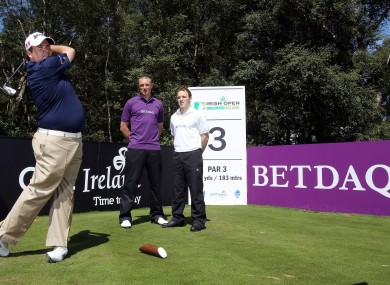 Darran O’Sullivan and Kieran Donaghy look on as former Irish Open champion Shane Lowry aims a shot at the 200 yard par three third at Killarney GC. BETDAQ, Ireland’s leading betting exchange, will donate €50,000 to the charity of choice to the first golfer who hits a ‘hole in one’ at the third hole.