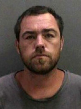 A booking photo released by Orange County Sheriff's Dept of Sloan Briles