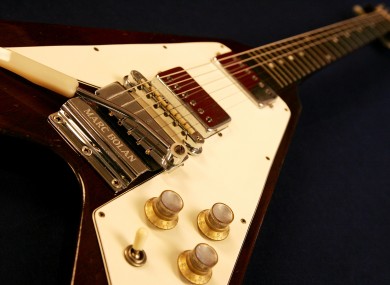 A Gibson Flying V electric guitar used by late rock musician Marc Bolan.