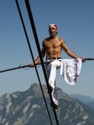 Freddy Nock walking up the rope of a cable car in Ebensee, Austria on Monday