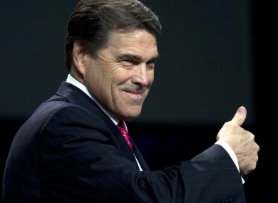 Texas Gov. Rick Perry gives a thumbs up as he takes the stage at The Response, a call to prayer for a nation in crisis in Houston last week