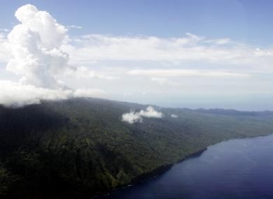 Steam rises from a volcano on the island of Ambae, part of the Vanuatu nation, in 2005. The islands, hit by an earthquake today, sit on the Pacific's Ring of Fire.