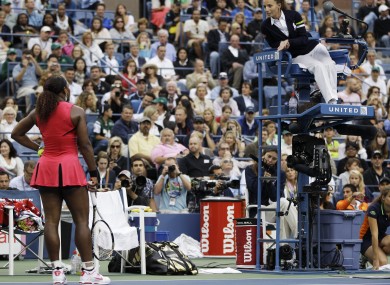 Serena confronts the umpire in New York.