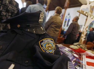 A uniform from the NYPD is displayed during a special service to commemorate the 10th anniversary of the 9/11, at a church in New Plymouth where the USA are playing Ireland in the Rugby World Cup.