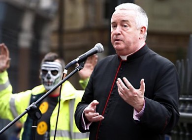 Graeme Knowles speaks to protesters yesterday.