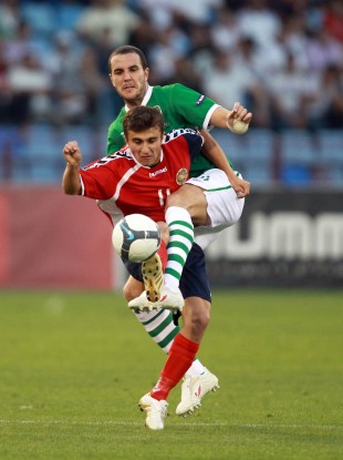 John O'Shea tussles with Armenia's Edgar Malakyan in Yerevan last year.