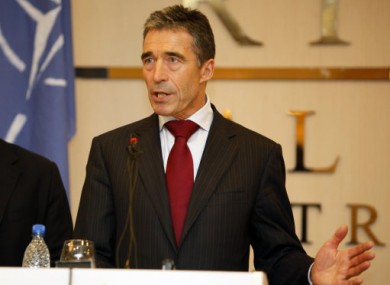 NATO Secretary-General Anders Fogh Rasmussen speaks to reporters in Tripoli.