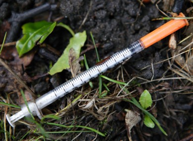 A discarded hypodermic needle