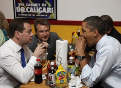 File photo of Medvedev and Obama enjoying burgers together in Virginia, US last year.