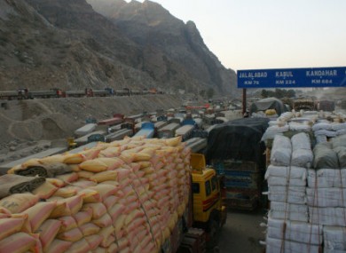 Trucks are parked at a road as authorities closed the Torkham border for NATO supply trucks at Pakistani border town of Torkham.