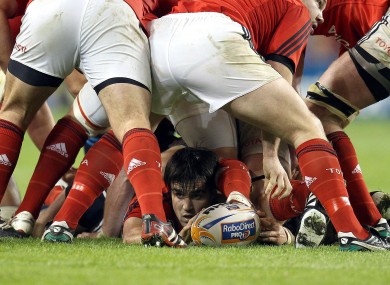 Munster's Cono Murray in the thick of it on Friday night.