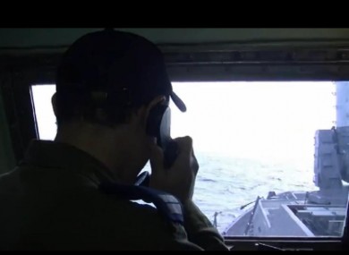 IDF personnel issue a warning to the two boats