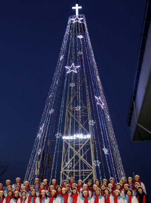 South Korean Christians sing a Christmas song in front of a 100-foot-tall (30-meter-tall) steel Christmas tree near the demilitarised zone dividing the two Koreas.
