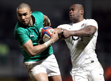 Simon Zebo hands off Ugo Monye of the England Saxons to score a late try on Saturday. Ireland Wolfhounds lost 23-17.