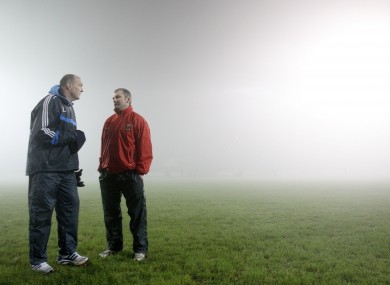 Dublin manager Pat Gilroy and Mayo manager James Horan talk after the game was called off at half-time.