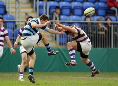 Max McFarland of Clongowes Wood College and Castleknock College's Mark Bennett at Donnybrook yesterday.