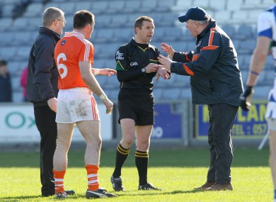 Assistant manager Paul Grimley appeals to referee Michael Duffy after sending off Ciaran McKeever before the start of the second half.