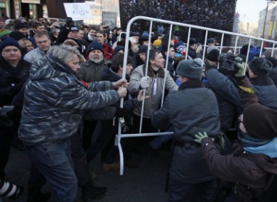 Opposition protesters clash with police in the centre of Moscow