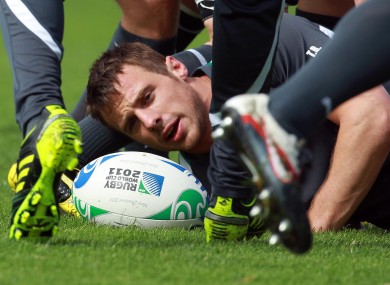 Tommy Bowe takes a breather beneath a ruck