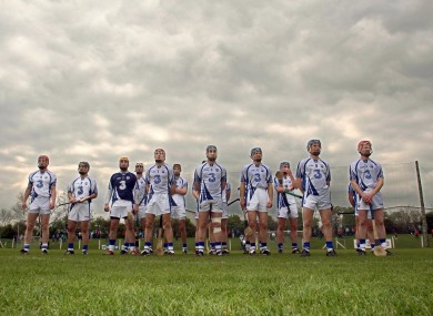 The Waterford team stand for the anthem in Dungarvan.