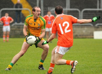 Donegal's Neil Gallagher with Anto Duffy of Armagh.