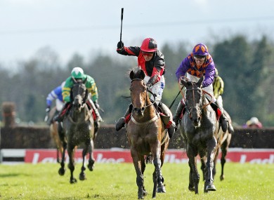 ndrew Thornton celebrates winning the Ladbrokes Irish Grand National Steeplechase on Lion Na Bearnai.